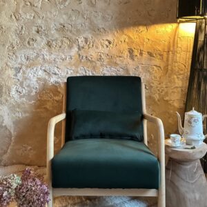 Fauteuil en velours vert uni