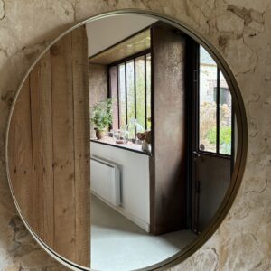 Grand miroir doré rond
